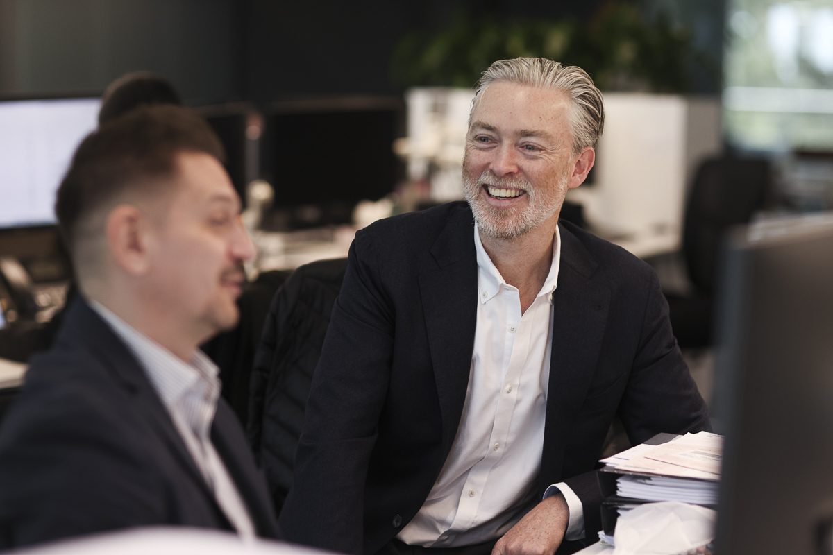 James Carey with a colleague in the North Sydney office