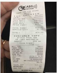 A printed taxi receipt